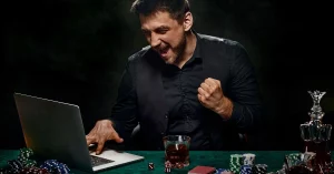 Man Online Gambling while Drinking
